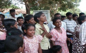 a_displaced_tamil_woman_holds_her_baby_at_a_refugee_camp_in_northern_sri_lanka